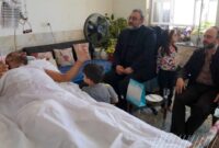 عیادت مهندس طاهرزاده مدیر عامل چادرملو و مهندس حسین پور مدیر مجتمع صنعتی اردکان از جانباز سرافراز، سرهنگ محمد حسین کمالی اردکانی